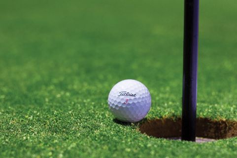 golf-ball-near-hole