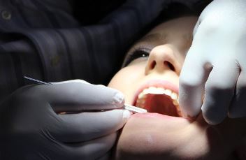 person-taking-dental-checking