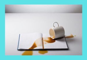 spilled-coffee-on-book-palegreen-background