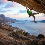 climber-climbing-overhanging-cliff
