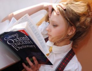 girl-reading-oxford-english-dictionary
